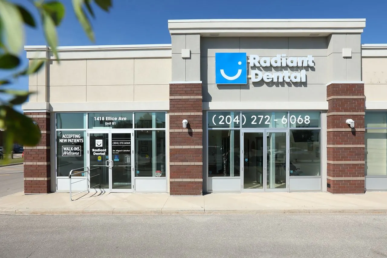 Radiant Dental storefront at 1418 Ellice Avenue with parking out front